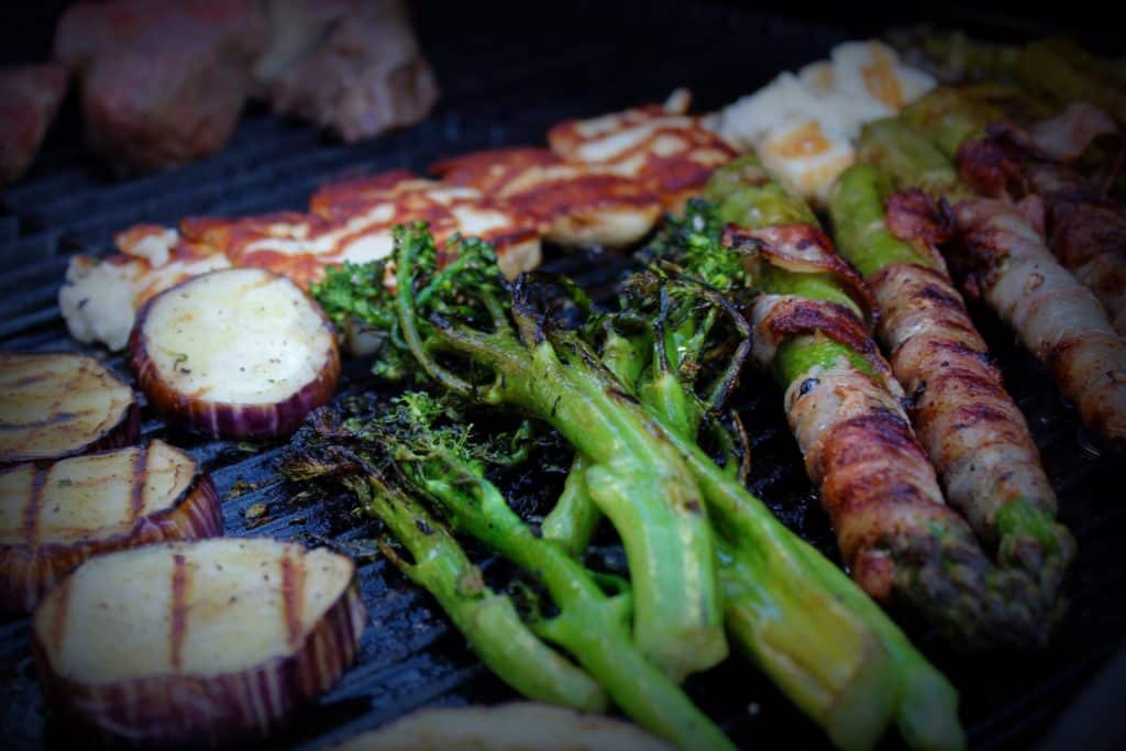 vegetables and meat on rocket stoves