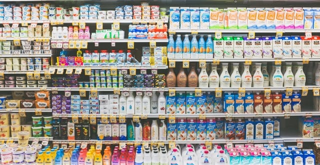 shelves in a grocery filled with products
