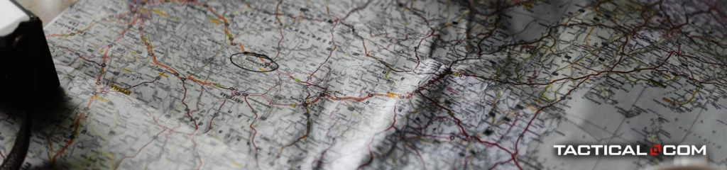 using a map to look for a good campsite