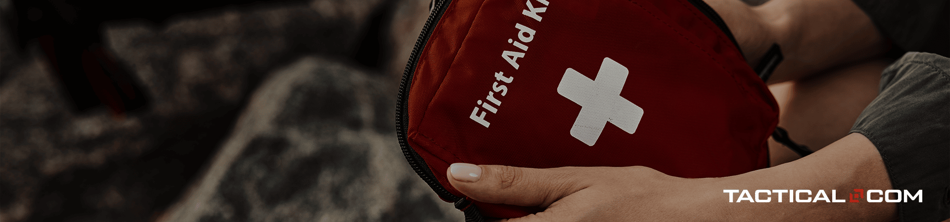 person holding first aid kit