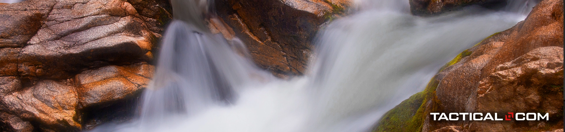 a natural body of water surrounded by huge stones