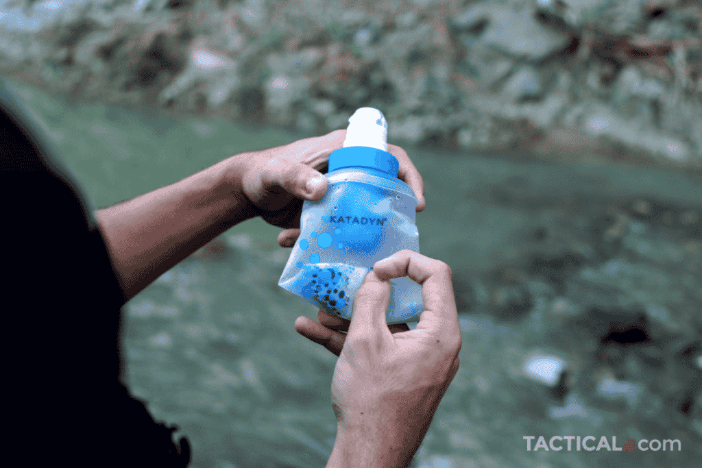 A man squeezing the Katadyn BeFree portable water filter