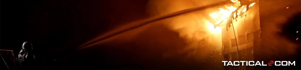 a firefighter rescuing a burning building