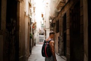 man carrying a backpack