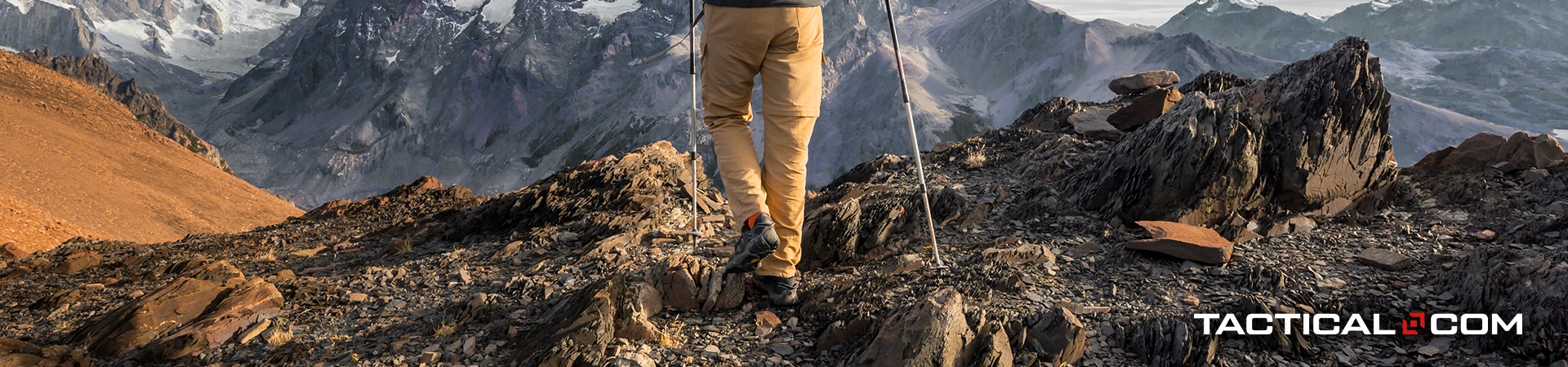person hiking with help from trekking poles