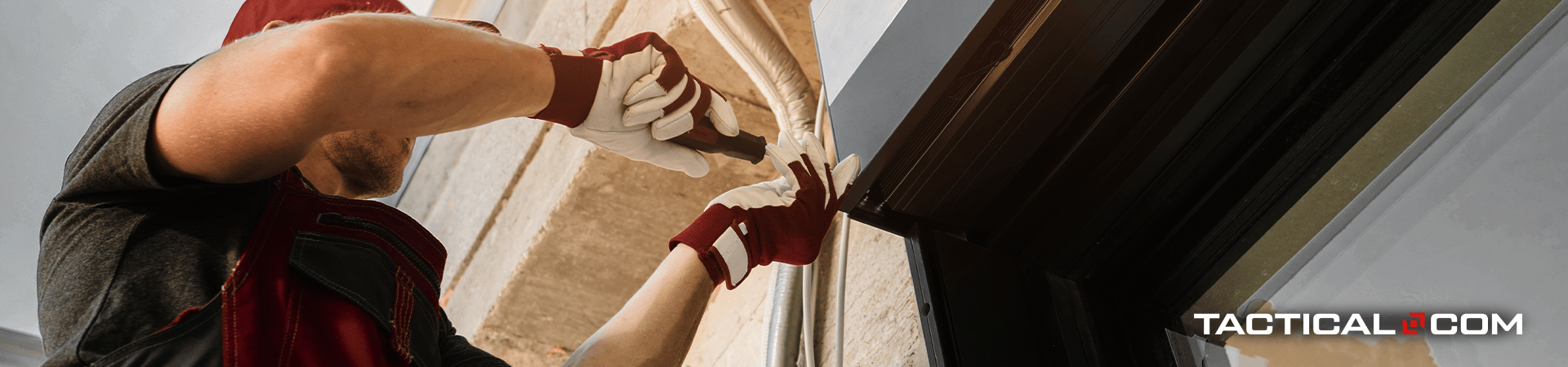 man working on securing window entry points for home fortification