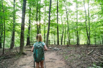 kid in the wilderness with a bug out bag