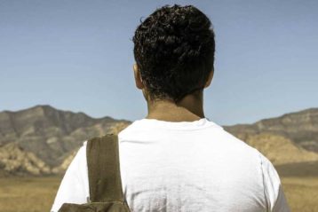 man with backpack