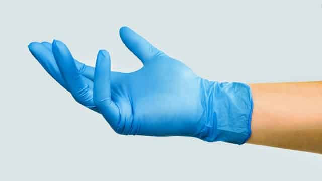 hand wearing medical gloves
