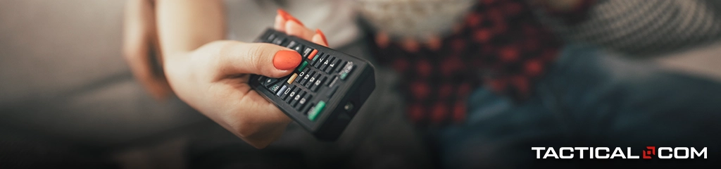 woman using a tv remote
